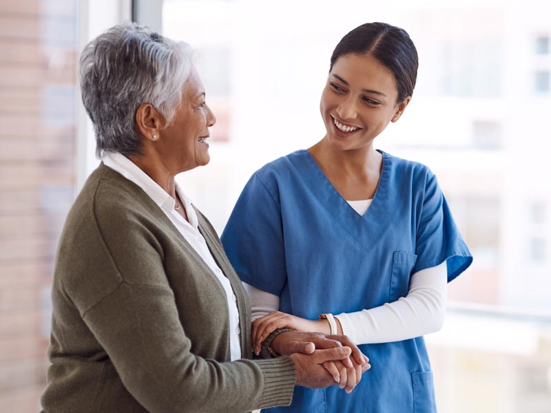 nurse caring for patient